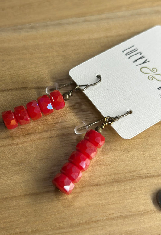 Red wagon wheel crystal earrings