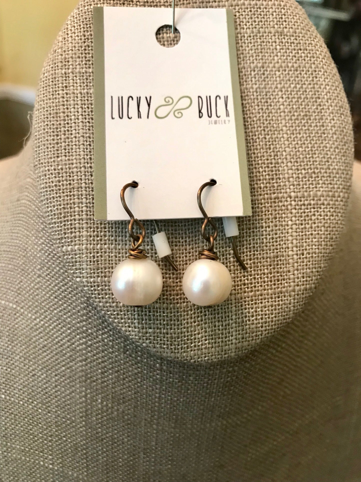Single pearl earrings